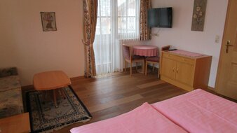 Schlafzimmer in Saalfelden | © Pension Kröll